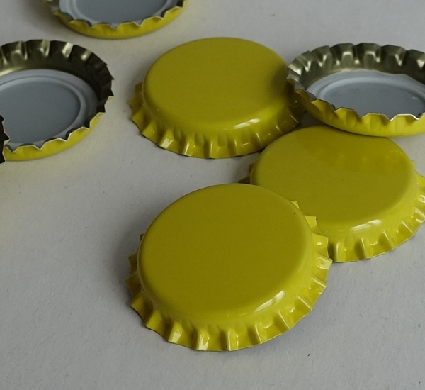 Capsules couronnes jaune 26mm 10.500p